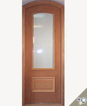 G114AT entrance door in 100% solid Spanish cedar. Shown with clear beveled insulated glass, raised panel and applied moldings.
