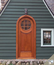 G165RTC shown in solid Spanish cedar with arched panel and RM5 applied moldings.