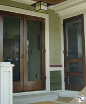 Double Manhattan screen & storm door. Shown in Solid Poplar with exterior stain/urethane by others. Browse more Traditional designs which can be made into double doors like this one.